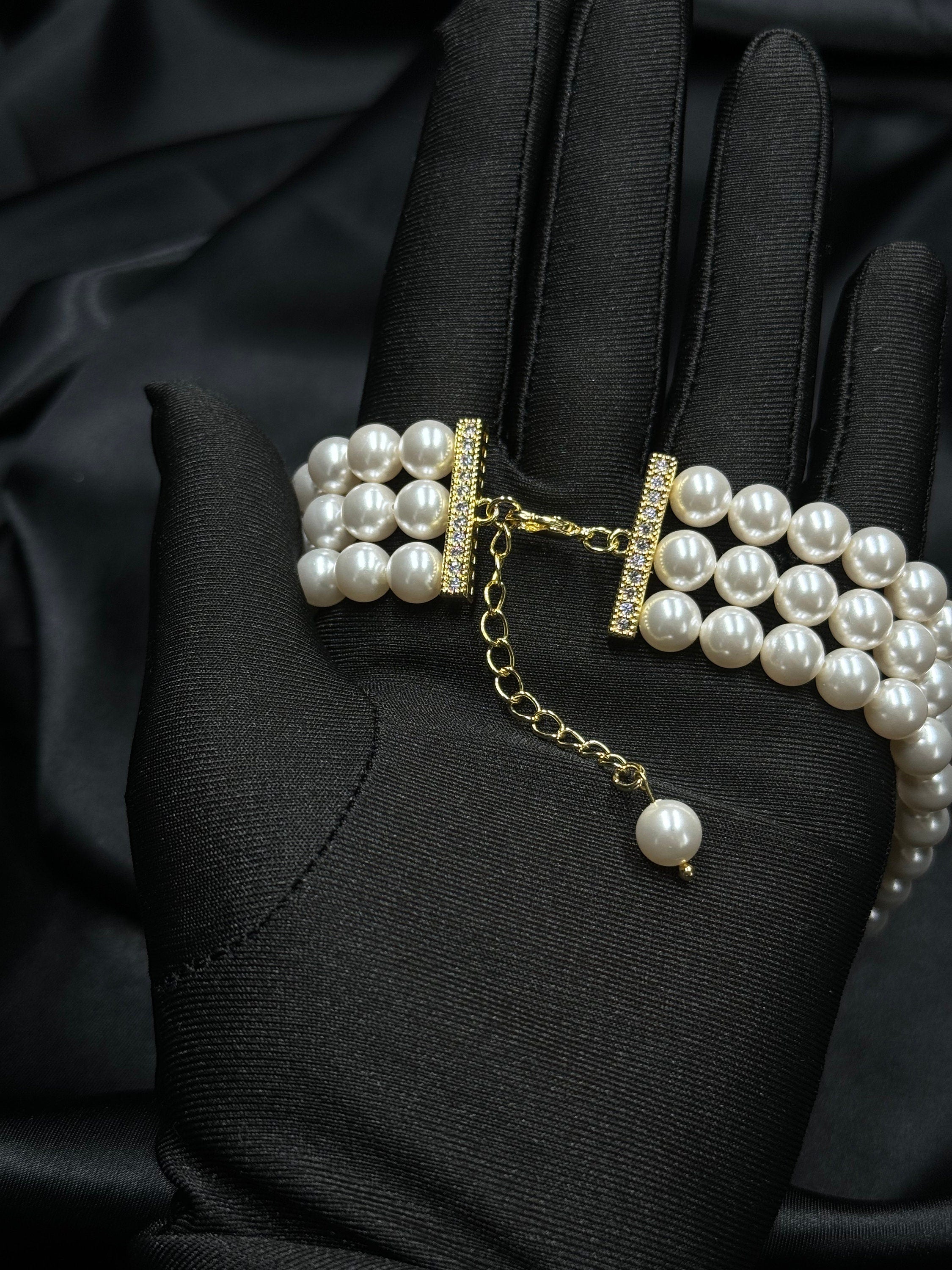 Three rows bridal pearl choker necklace made with 3 layers of Swarovski pearls and gold or silver rhinestones clasp