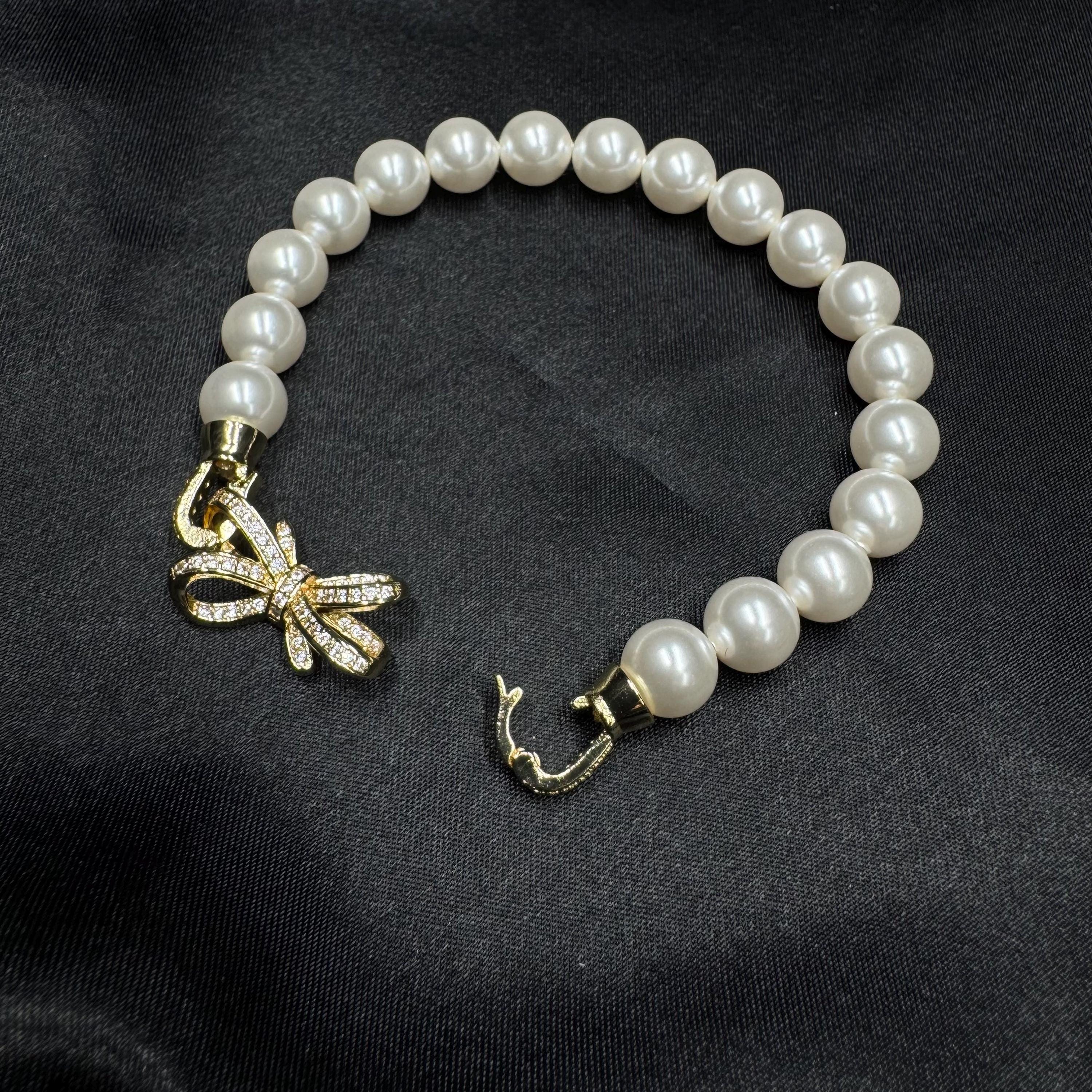 Holiday Gift Bracelet Crystal Pearl Design Secret Santa Present Christmas Stocking Filler Elegant Jewelry Option Bow Clasp Feature Rhinestone Accent Detail Premium Quality Construction Thoughtful Gift Idea Beautiful Accessory Piece Festive
