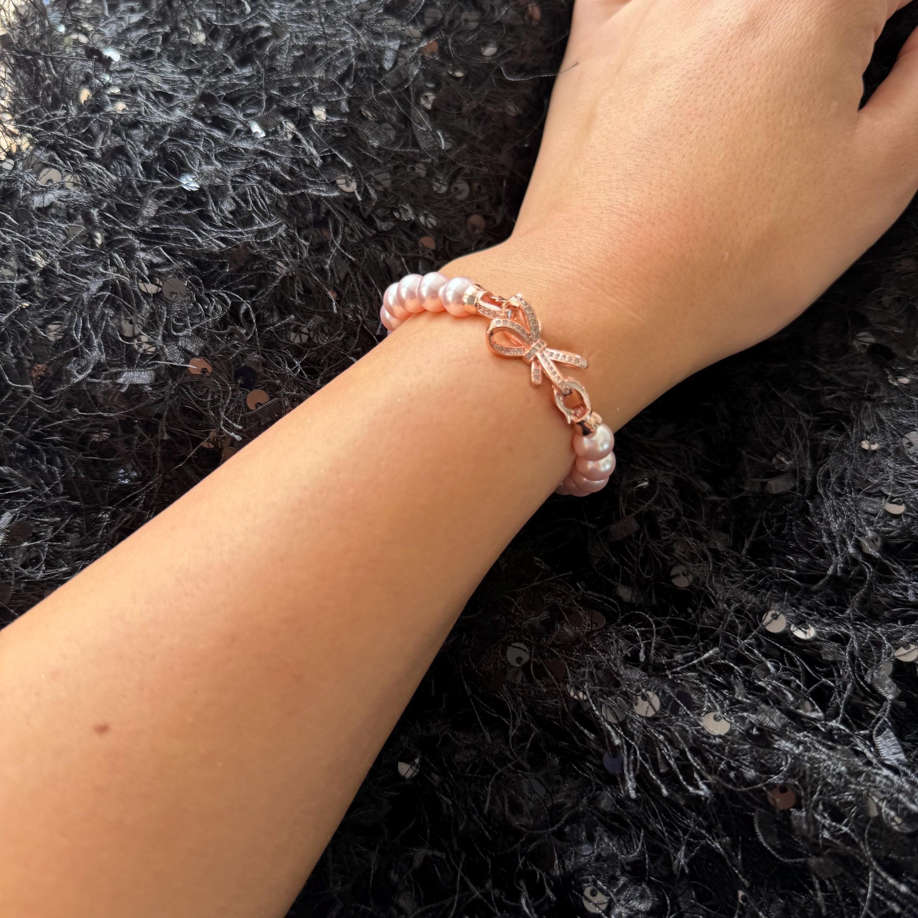 Christmas Gift Idea Pink Pearl Bracelet Secret Santa Present Holiday Jewelry Collection Bow Charm Design Crystal Pearl Accessory Elegant Gift Option Adjustable Length Bracelet Feminine Style Jewelry Perfect Birthday Present Customizable
