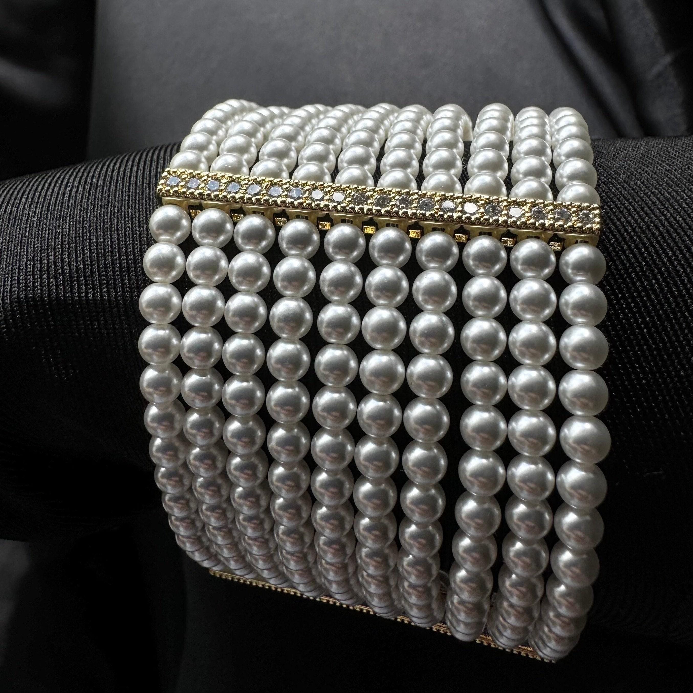 Statement Wedding Bracelet Pearl Strand Design Elegant Bridal Jewelry Luxurious Wrist Adornment Ten Layer Construction Rhinestone Detail Gold Silver Clasp Options Formal Event Accessory Special Occasion Piece Sophisticated Wedding Day Look