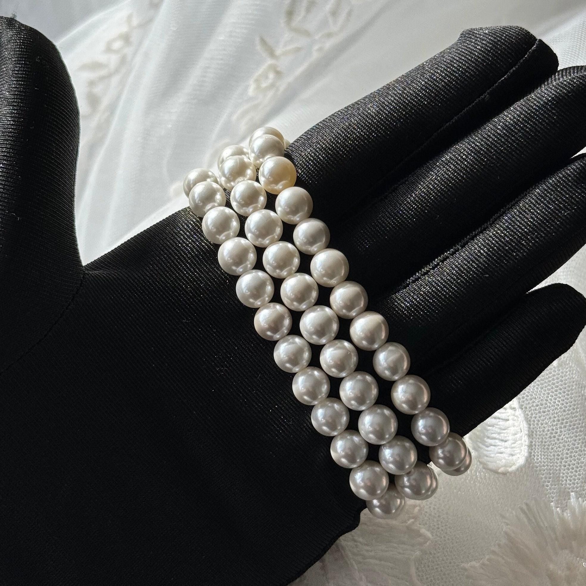 Statement Piece Bracelet Layered Pearl Design Elegant Wedding Accessory Bridal Jewelry Collection Three Strand Arrangement Crystal Pearl Elements Gold Plated Clasp Vintage Style Appearance Formal Event Essential Perfect Wedding Gift Classic