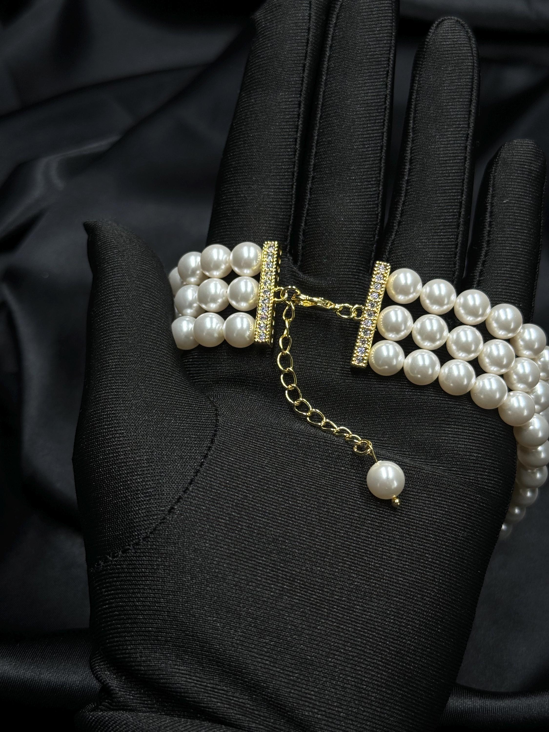 Statement Piece Bracelet Layered Pearl Design Elegant Wedding Accessory Bridal Jewelry Collection Three Strand Arrangement Crystal Pearl Elements Gold Plated Clasp Vintage Style Appearance Formal Event Essential Perfect Wedding Gift Classic