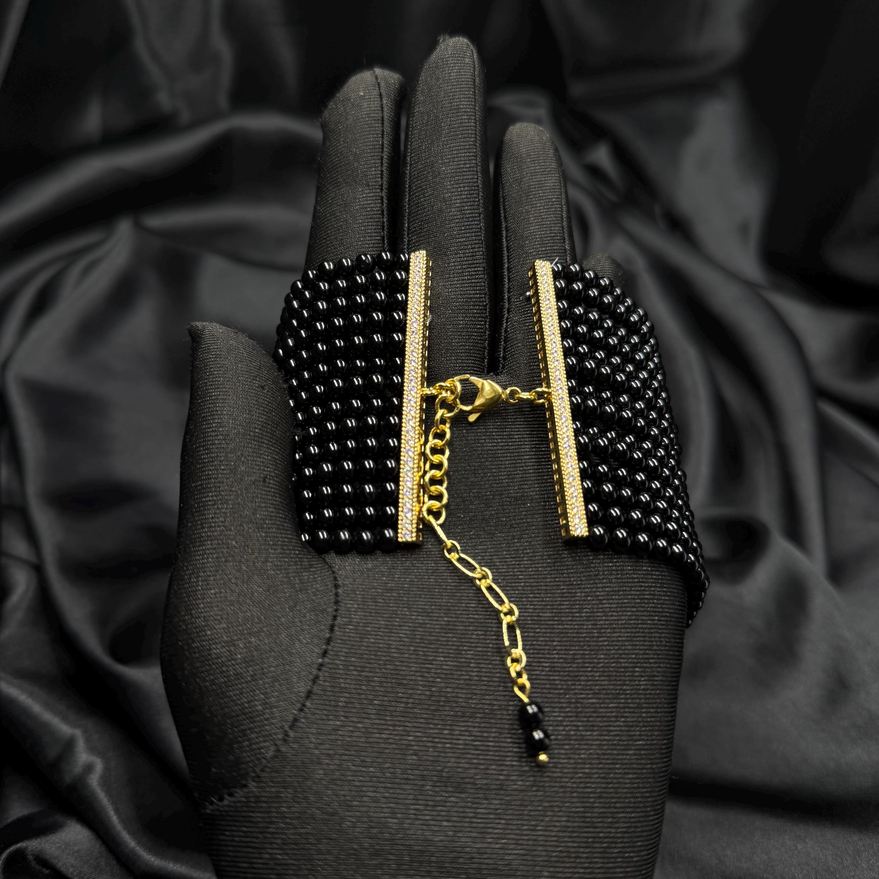 Black Agate Bracelet Wide Cuff Design Multiple Strands Beaded Construction Zircon Adorned Centerpiece Luxury Statement Jewelry Elegant Evening Accessory Formal Wear Collection Gold Platinum Finish Options Adjustable Length Custom Fit