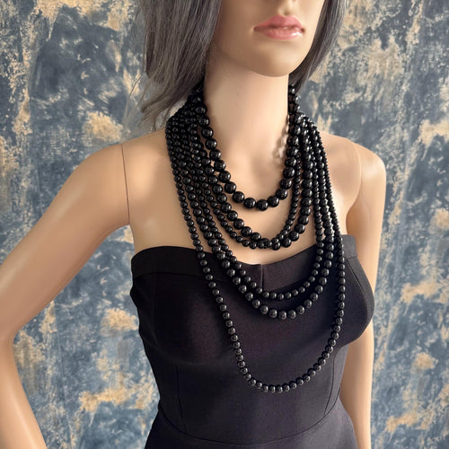 Black Agate Necklace Layered Statement Jewelry Bold Fashion Accessory Timeless Design Chunky Bead Collection Cascade Multilayer Style Gold Clasp Detail Elegant Costume Jewellery Versatile Office Wear Evening Outfit Enhancement Special