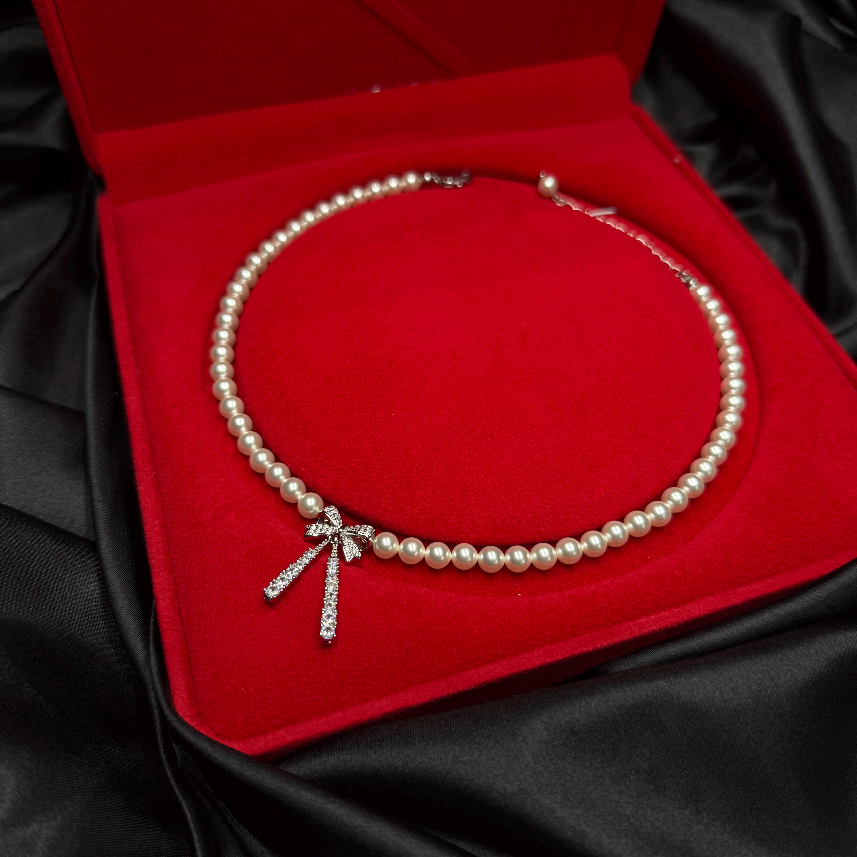 Dainty Bow Necklace Pearl Crystal Design Elegant Choker Style Adjustable Length Chain Gold Silver Options Premium Quality Materials Sophisticated Neck Piece Formal Event Jewelry Special Occasion Accessory Perfect Gift Idea Women Feminine