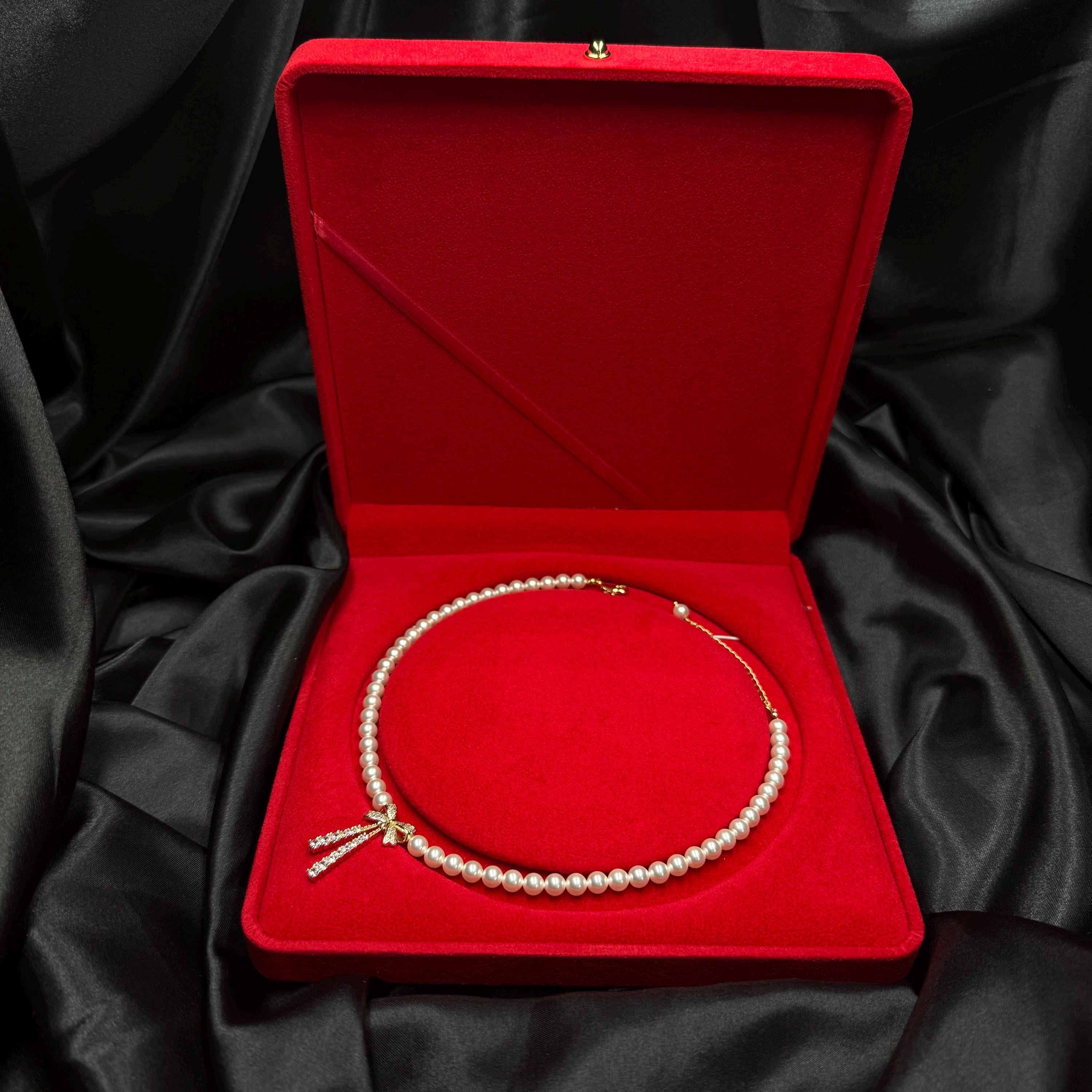 Pearl Bow Necklace Luxury Gift Box Perfect Wife Present Elegant Jewelry Design Crystal Pearl Choker Rhinestone Charm Detail Adjustable Length Chain Gold Silver Options Red Velvet Packaging Holiday Anniversary Gift Special Occasion Jewelry