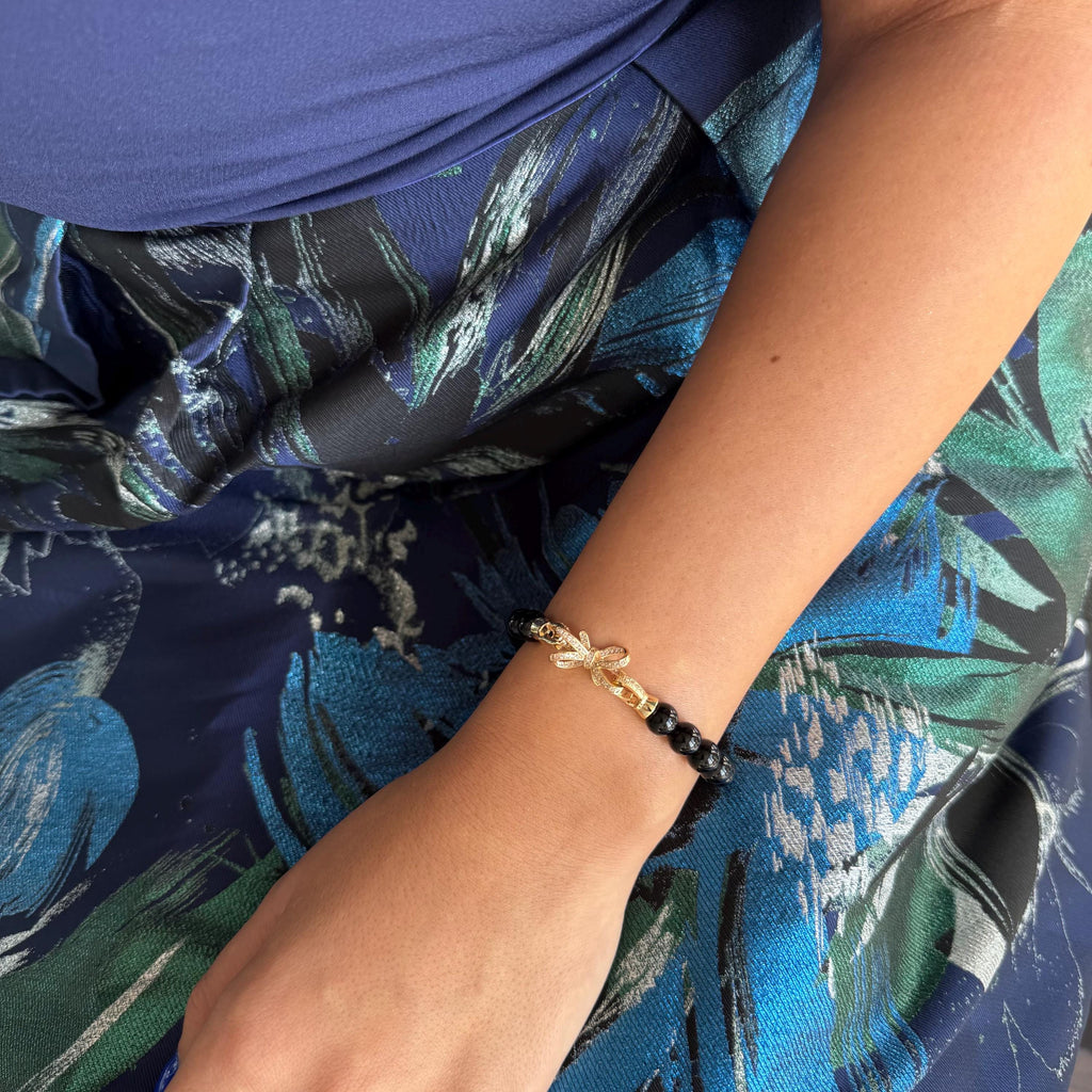 Elegant Jewelry Design Black Pearl Bracelet Gold Charm Detail Crystal Accent Piece Sophisticated Style Statement Fashion Forward Creation Luxury Accessory Collection Special Occasion Essential Perfect Gift Idea Timeless Beauty Classic