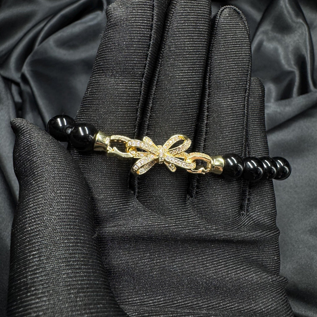 Statement Jewelry Piece Black Pearl Bracelet Gold Charm Accent Crystal Detail Work Elegant Design Element Sophisticated Style Fashion Forward Creation Luxury Gift Option Special Occasion Essential Perfect Present Idea Timeless Beauty