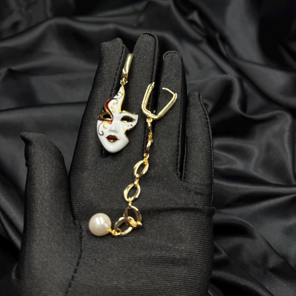 Luxury Pearl Earrings Gold Hoop Design Venetian Mask Charm Asymmetrical Style Statement Jewelry Handmade Creation Unique Gift Idea Mismatched Earring Pair Crystal Detail White Gold Accents Carnival Accessory Evening Wear Formal Events