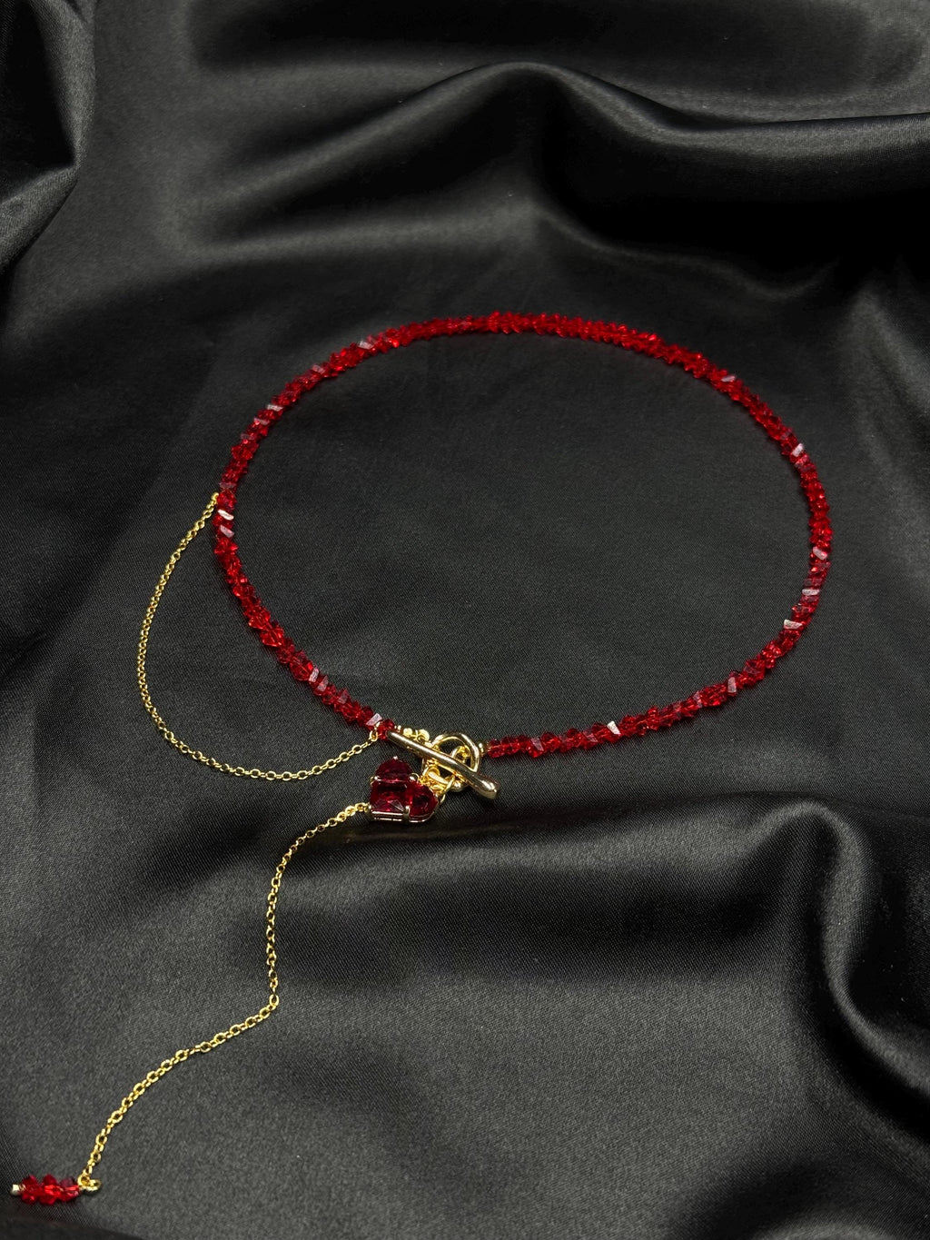 Fashion Forward Accessory Red Beaded Choker Necklace Gold Toggle Design Heart Charm Detail Statement Jewelry Piece Elegant Women Collection Modern Style Trend Premium Quality Construction Valentine Gift Idea Special Occasion Wear