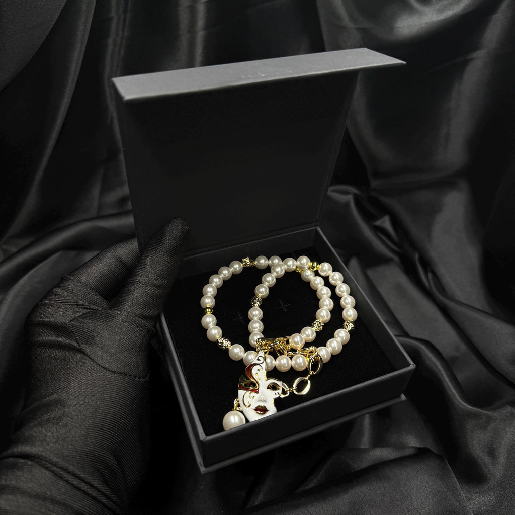 Statement Jewelry Collection Venetian Mask Design Pearl Necklace Set Crystal Pendant Earrings Gold Plated Finish Luxury Choker Accessory Masquerade Ball Essential Formal Event Piece Dramatic Styling Elegant Gift Option Special Occasion Wear