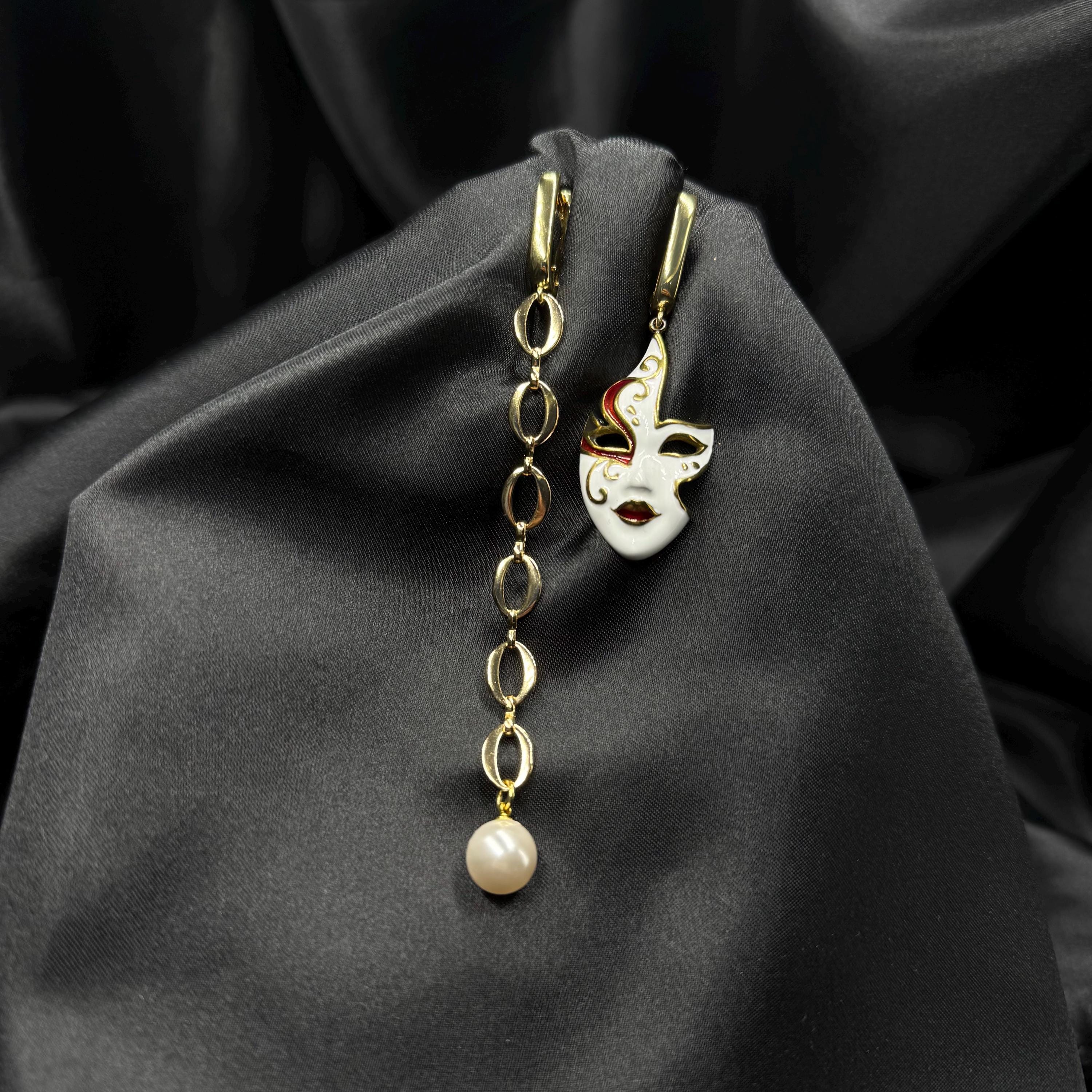 Luxury Pearl Earrings Gold Hoop Design Venetian Mask Charm Asymmetrical Style Statement Jewelry Handmade Creation Unique Gift Idea Mismatched Earring Pair Crystal Detail White Gold Accents Carnival Accessory Evening Wear Formal Events