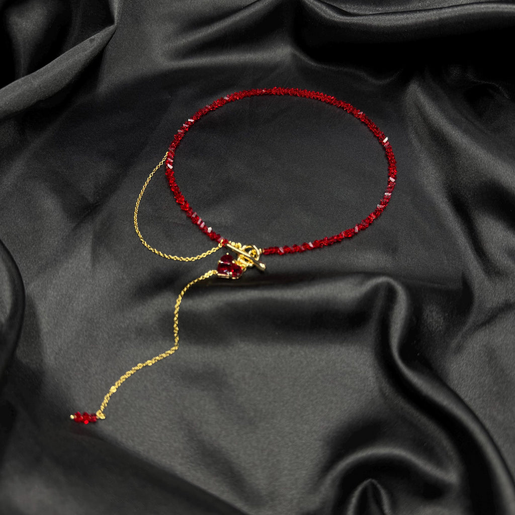 Fashion Forward Accessory Red Beaded Choker Necklace Gold Toggle Design Heart Charm Detail Statement Jewelry Piece Elegant Women Collection Modern Style Trend Premium Quality Construction Valentine Gift Idea Special Occasion Wear
