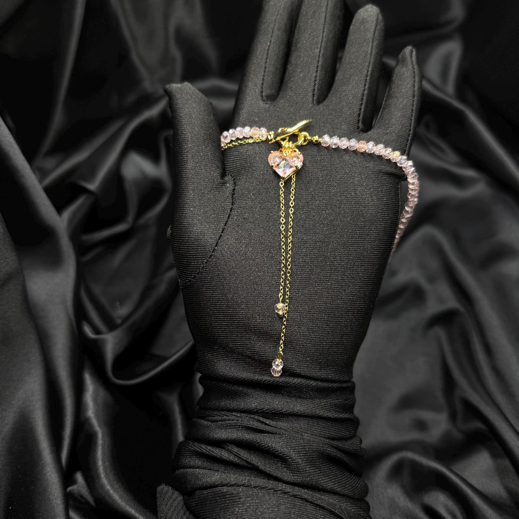 Dainty Lariat Necklace Pink Glass Beads Gold Heart Charm Elegant Minimalist Design Fashion Forward Accessory Feminine Style Statement Choker Length Jewelry Toggle Clasp Feature Romantic Gift Idea Valentines Present Perfect Everyday Wear