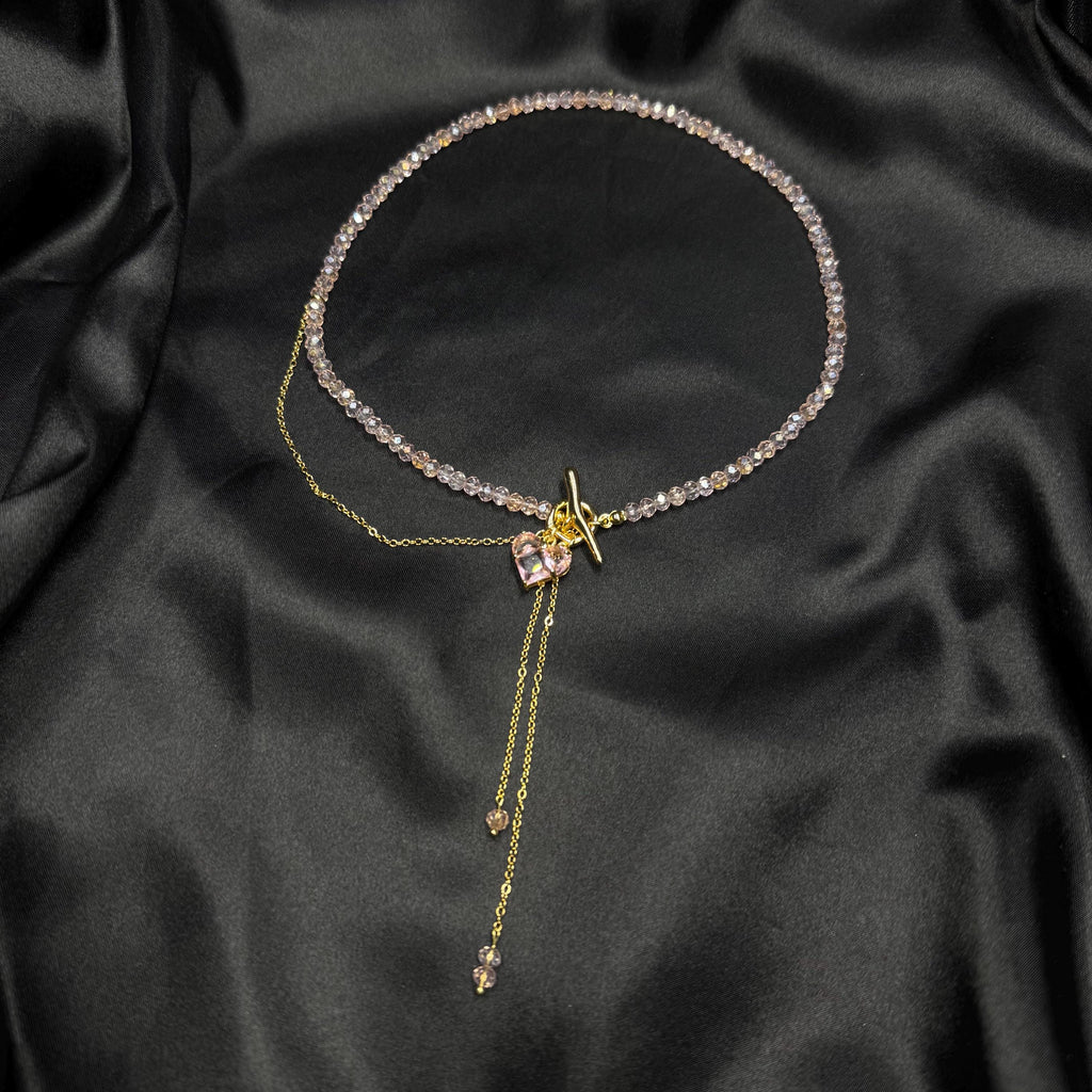 Romantic Heart Necklace Pink Glass Beaded Design Gold Charm Detail Toggle Clasp Closure Dainty Lariat Style Choker Length Option Valentines Gift Idea Beautiful Feminine Jewelry Elegant Minimalist Accessory Fashion Forward Piece Gift Box