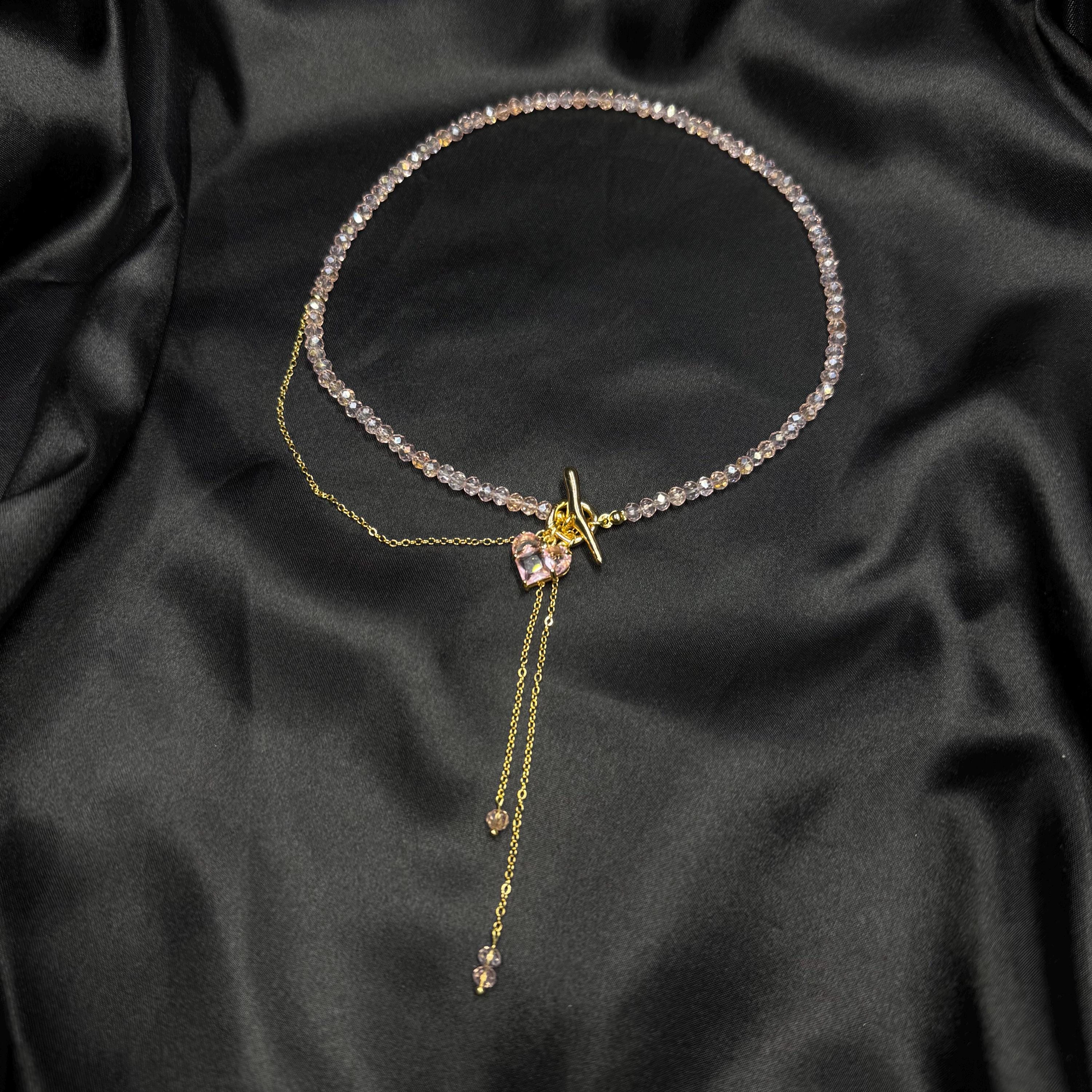 Romantic Heart Necklace Pink Glass Beaded Design Gold Charm Detail Toggle Clasp Closure Dainty Lariat Style Choker Length Option Valentines Gift Idea Beautiful Feminine Jewelry Elegant Minimalist Accessory Fashion Forward Piece Gift Box