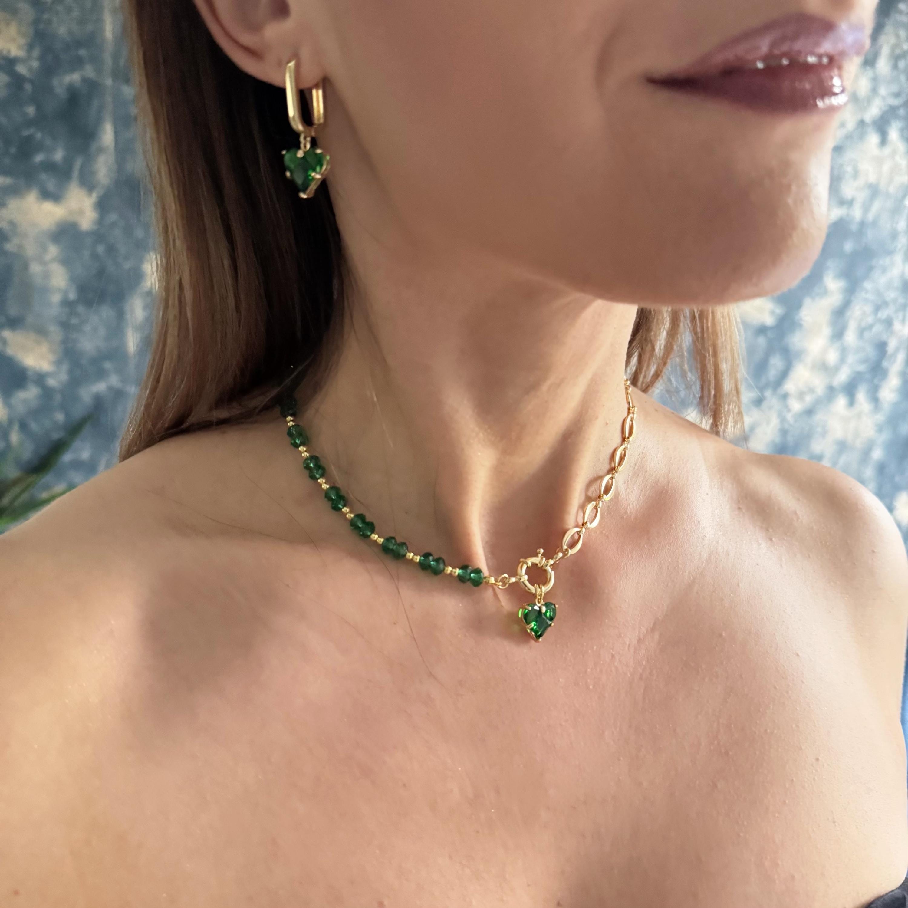 Asymmetrical Heart Earrings Emerald Green Crystal Design Gold Plated Chain Statement Jewelry Unique Modern Style Fashion Forward Accessories Special Occasion Wear Evening Event Elegance Romantic Gift Idea Luxury Handmade Earring Set