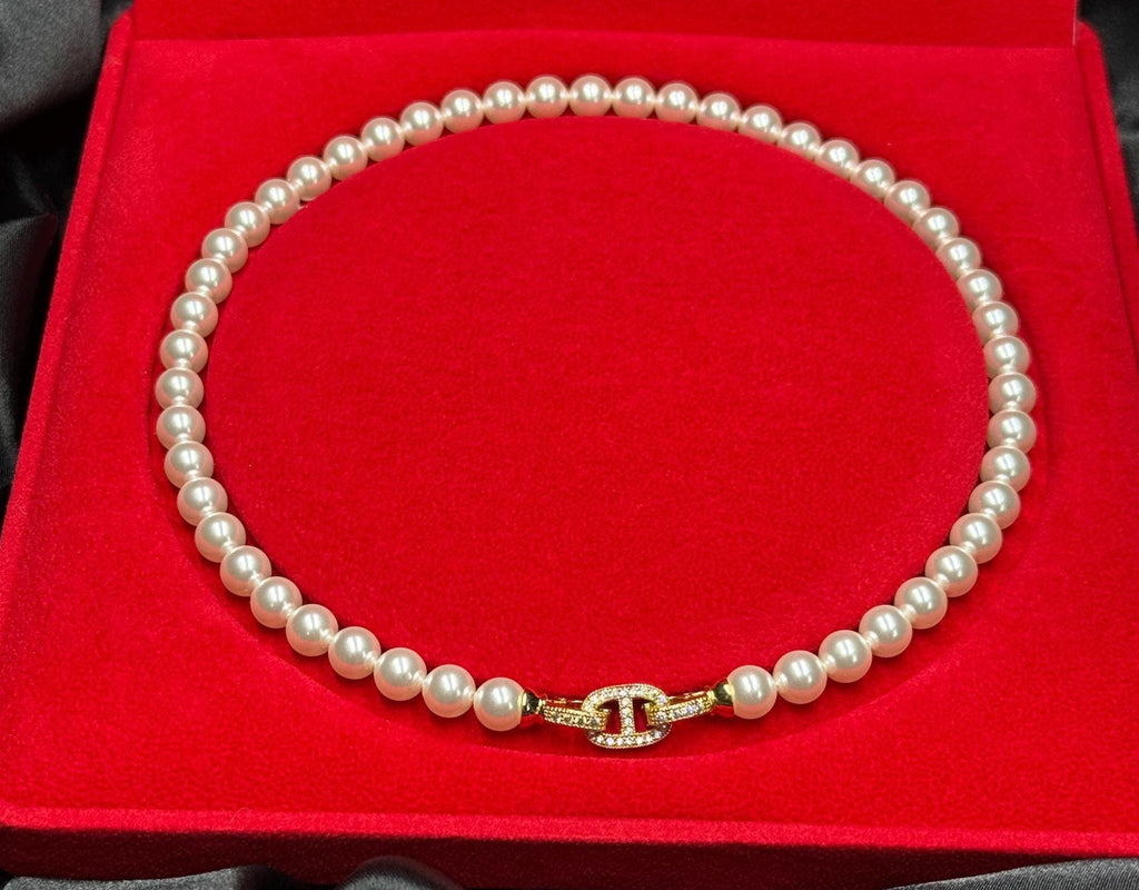 Swarovski pearl necklace Romantic Gift Necklace Crystal Pearl Design Elegant Anniversary Present Wife Birthday Surprise Luxury Jewelry Collection Special Occasion Piece Gold Plated Clasp Crystal Accent Details Eight MM Pearls Seventeen Inch Length Formal Event