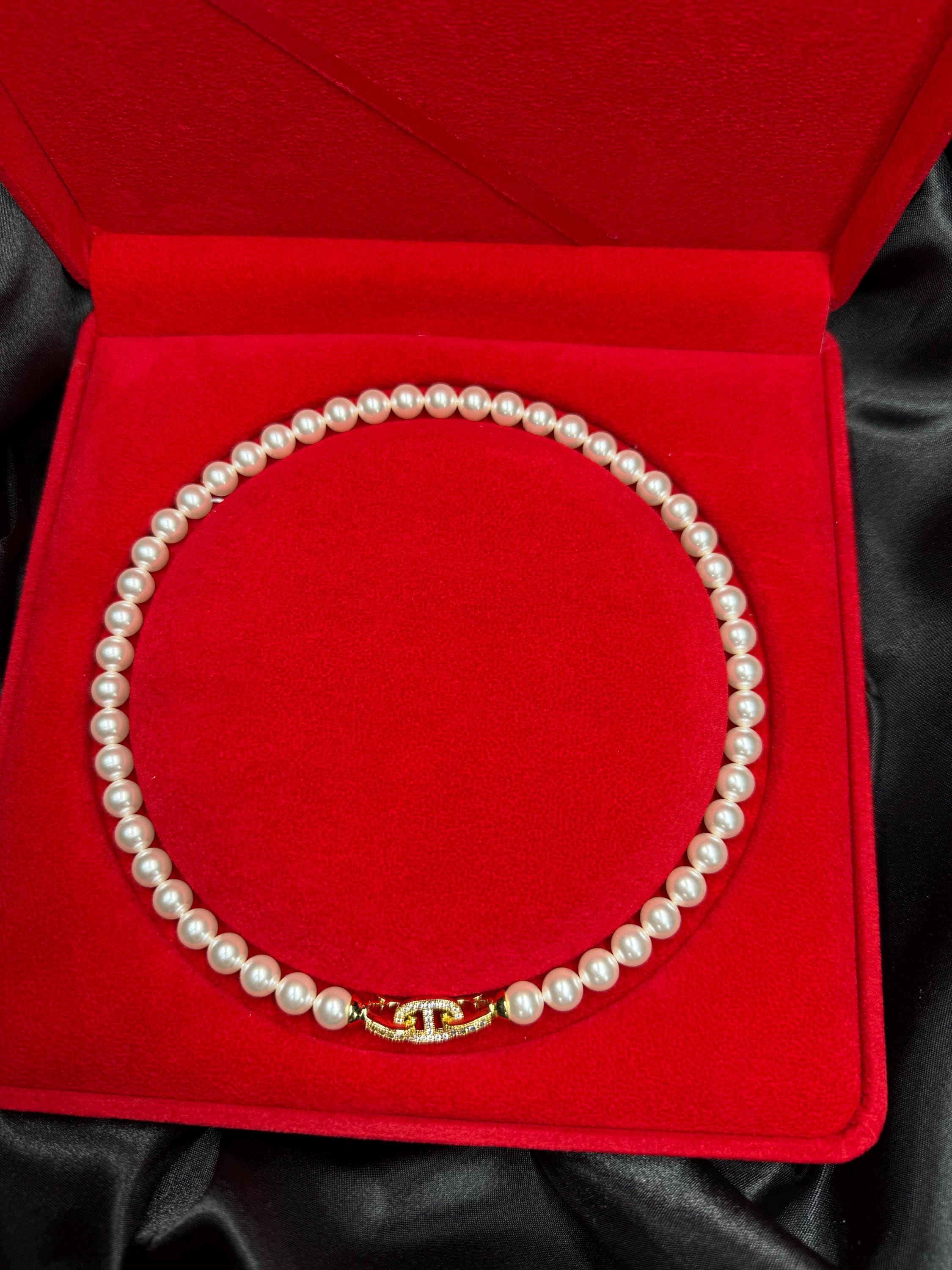 Swarovski pearl necklace Romantic Gift Necklace Crystal Pearl Design Elegant Anniversary Present Wife Birthday Surprise Luxury Jewelry Collection Special Occasion Piece Gold Plated Clasp Crystal Accent Details Eight MM Pearls Seventeen Inch Length Formal Event
