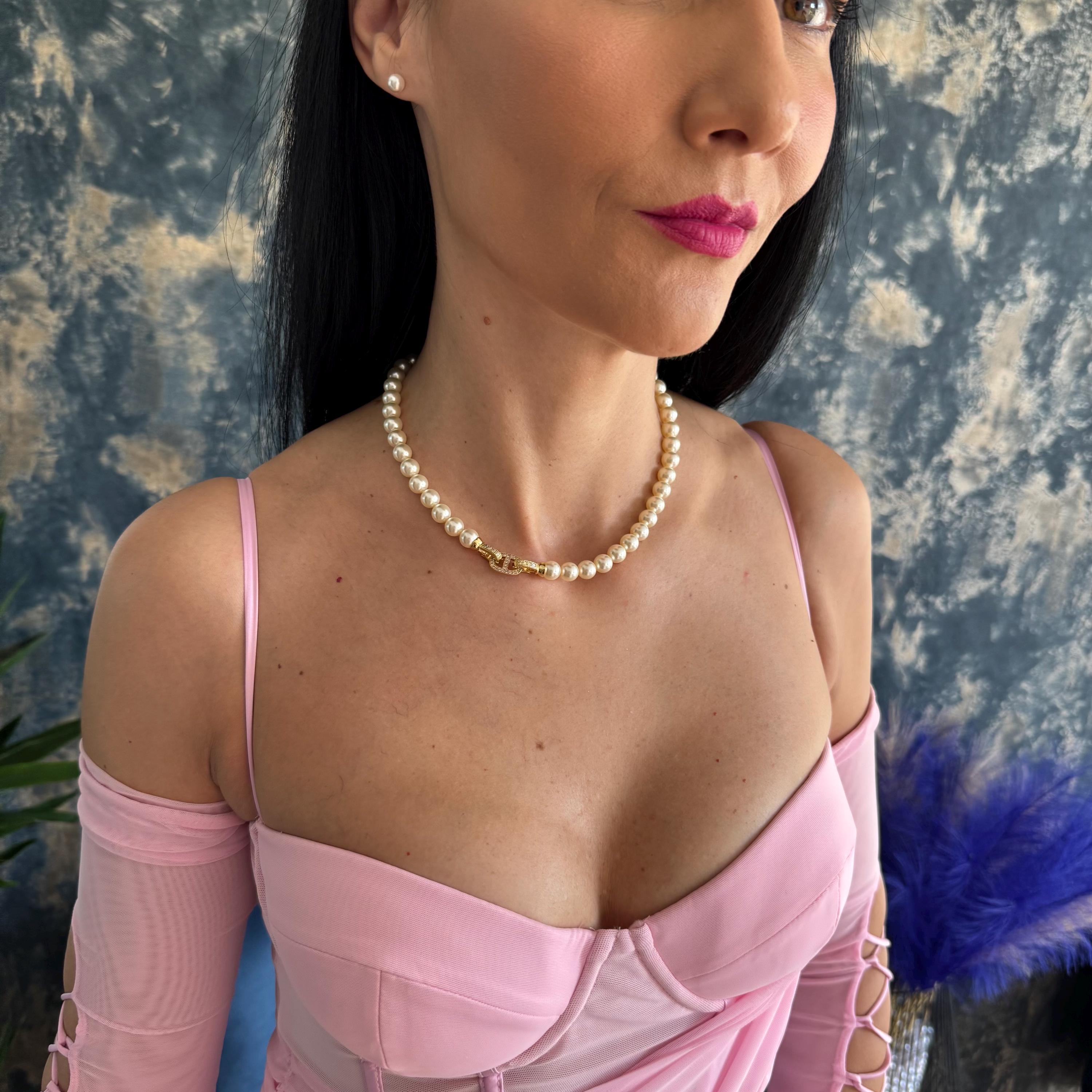 Swarovski pearl necklace Romantic Gift Necklace Crystal Pearl Design Elegant Anniversary Present Wife Birthday Surprise Luxury Jewelry Collection Special Occasion Piece Gold Plated Clasp Crystal Accent Details Eight MM Pearls Seventeen Inch Length Formal Event